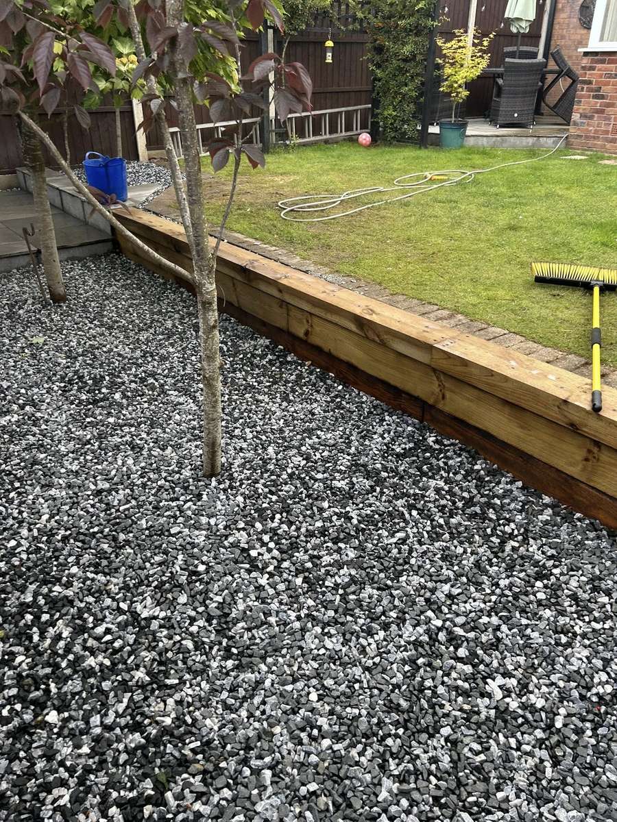 Sleeper edging and gravel finish completed by TMH Quality Construction